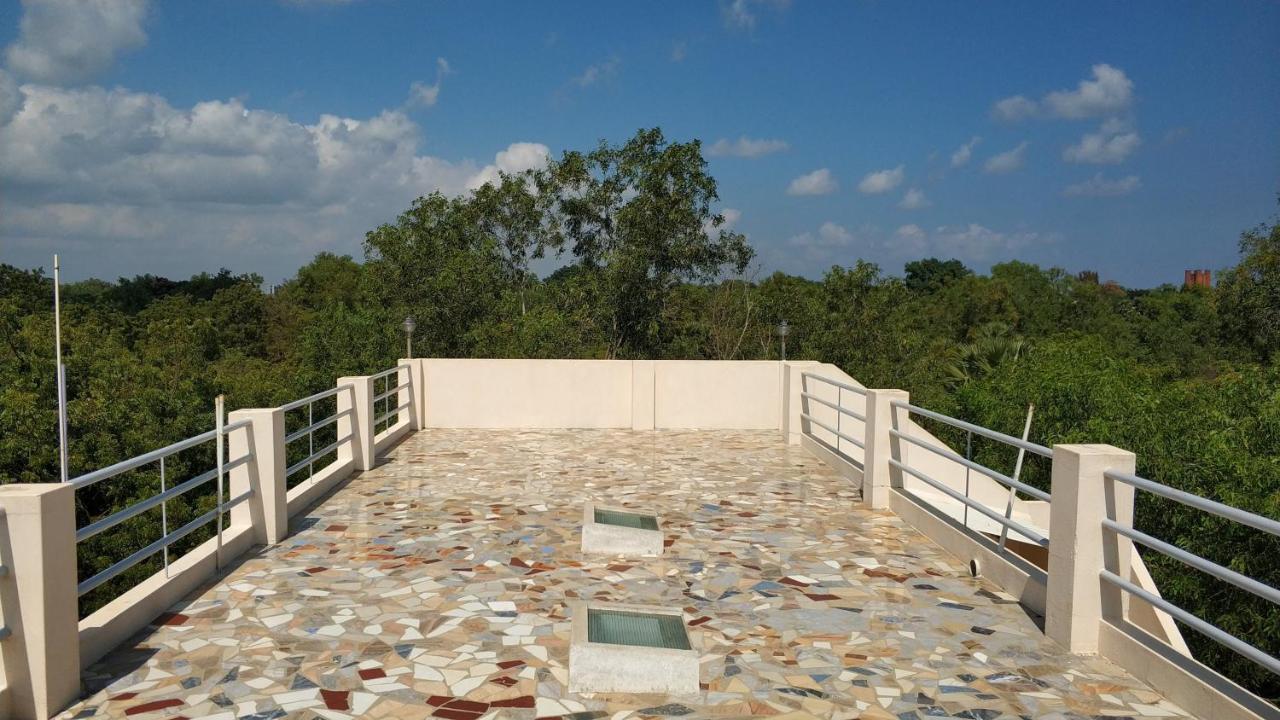 אורוויל Lotus Garden Guest House מראה חיצוני תמונה